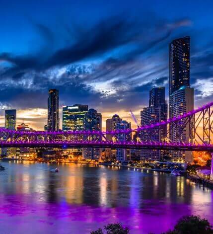 A stunning aerial shot of Melbourne's skyline at twilight, showcasing the city's vibrant energy and modern architecture.